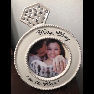 Picture frame” Bling bling I got the ring”